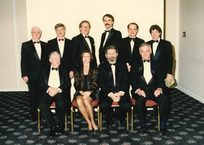 The new collection of Regional Senior Judges and Senior Advisors, in November 1990.  Back row, left to right: G. Michel, G. Campbell, J. Evans, B. Lennox, D. August, G. Lapkin (Senior Advisor, Co-ordinator of Justices of the Peace). Front row, left to right: B. Walmsley (Senior Advisor, ACJ Family), M. Hogan, S. Linden (Chief Judge), H. Momotiuk. Missing: R. Walneck. (Courtesy: S. Linden.)